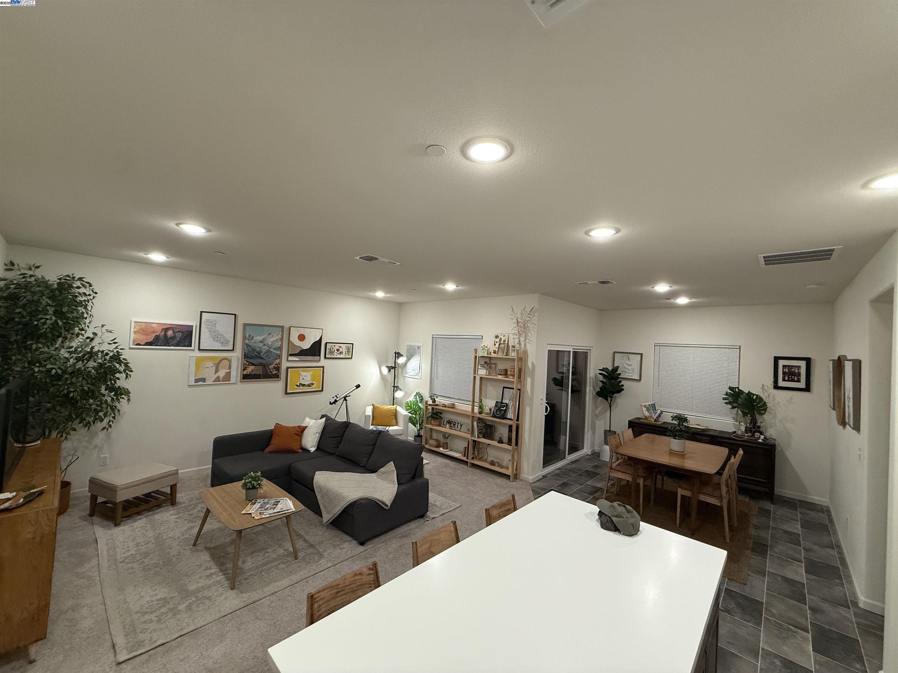 4246 Freemark Avenue Merced, CA 95348 - Photo 5 of 27 a living room with furniture and kitchen view