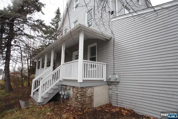 a front view of a house with balcony