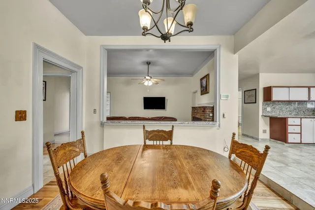 a living room with granite countertop furniture and a fireplace