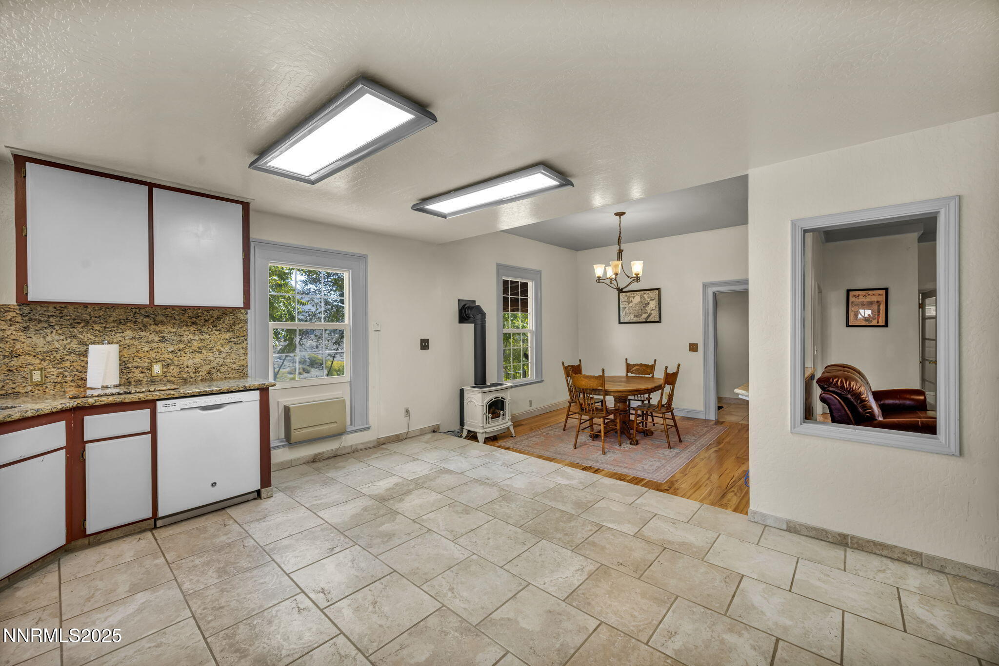 100 Pedlar Road Silver City, NV 89428 - Photo 15 of 65 a living room with granite countertop furniture and a fireplace