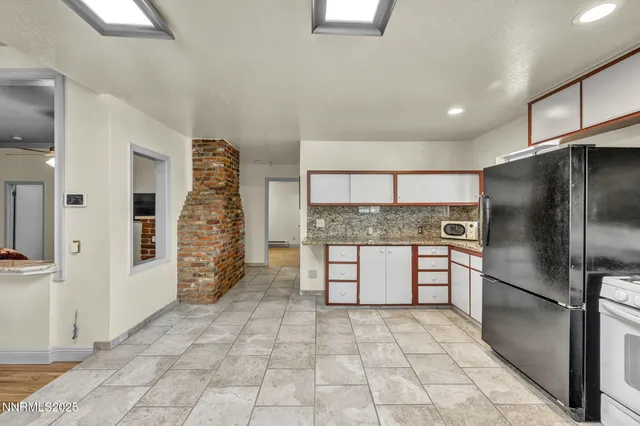 a view of a bathroom with wooden floor