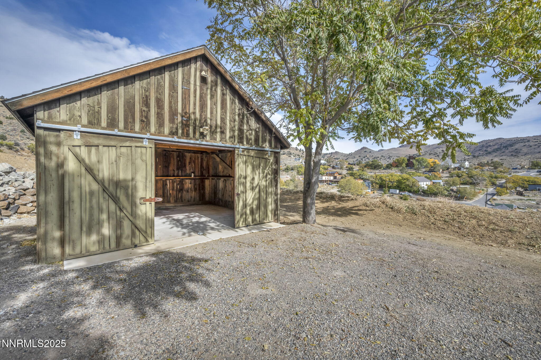 100 Pedlar Road Silver City, NV 89428 - Photo 48 of 65 a view of an house with backyard and trees