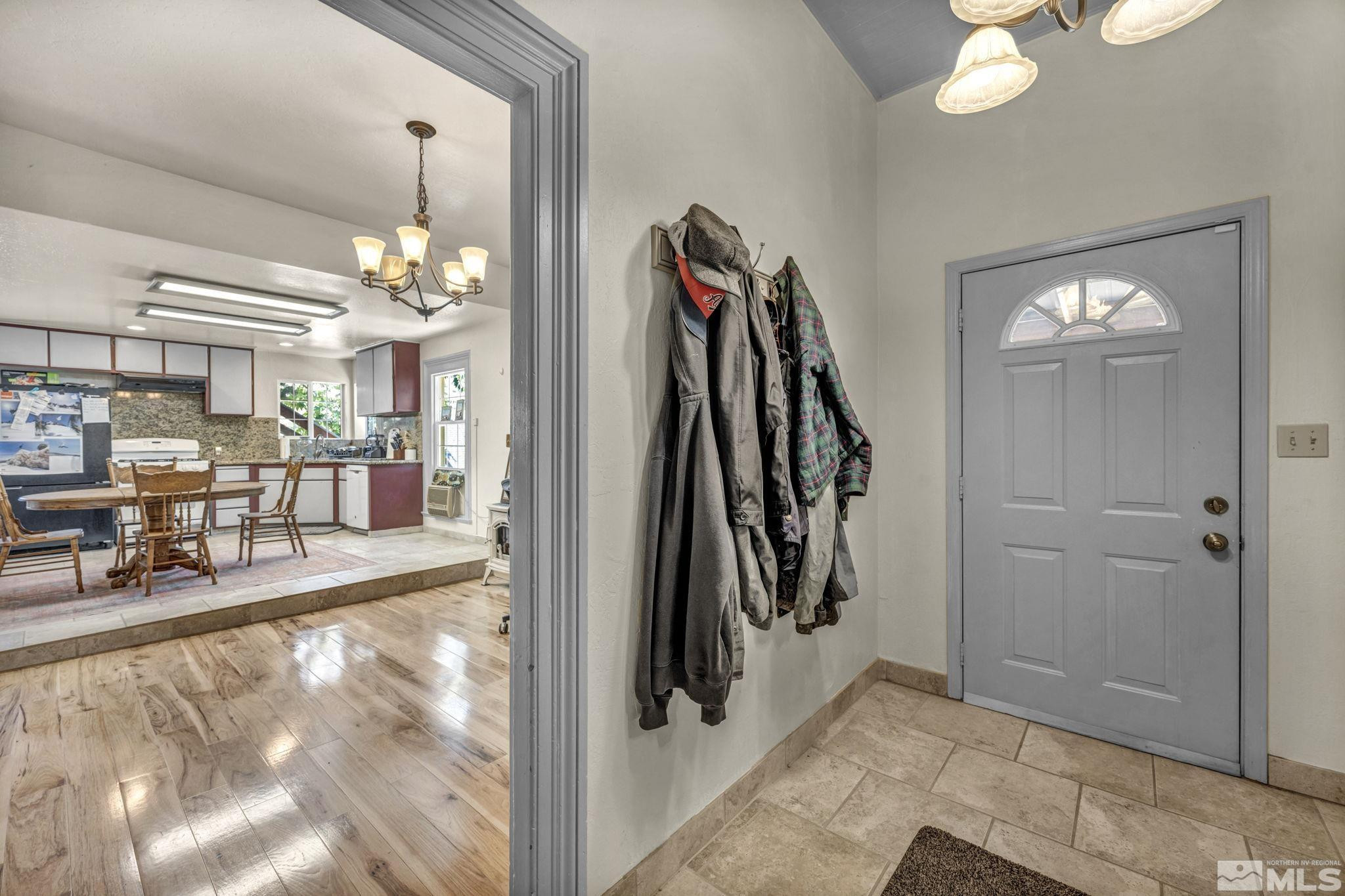 100 Pedlar Road Silver City, NV 89428 - Photo 6 of 65 a view of a livingroom kitchen and dining room view
