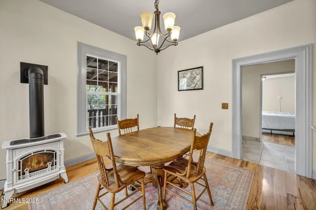 a kitchen with stainless steel appliances granite countertop a stove sink and cabinets