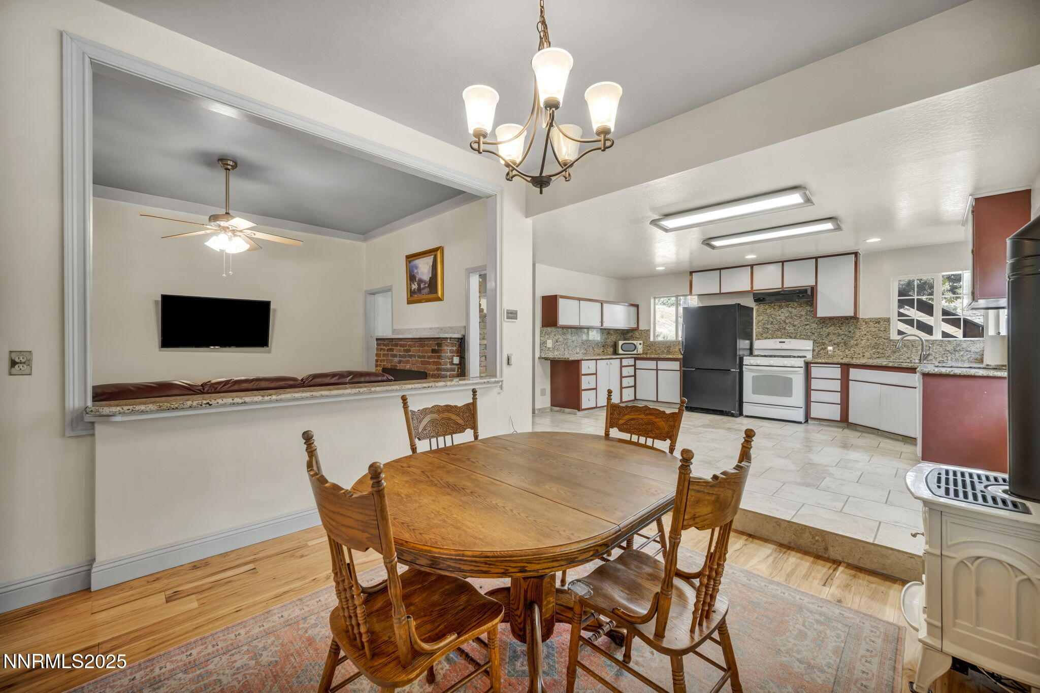100 Pedlar Road Silver City, NV 89428 - Photo 10 of 65 a view of a dining room with furniture and wooden floor