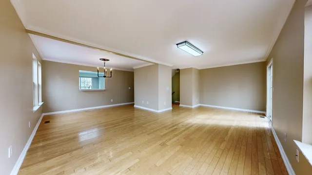 a view of livingroom with hardwood floor and window