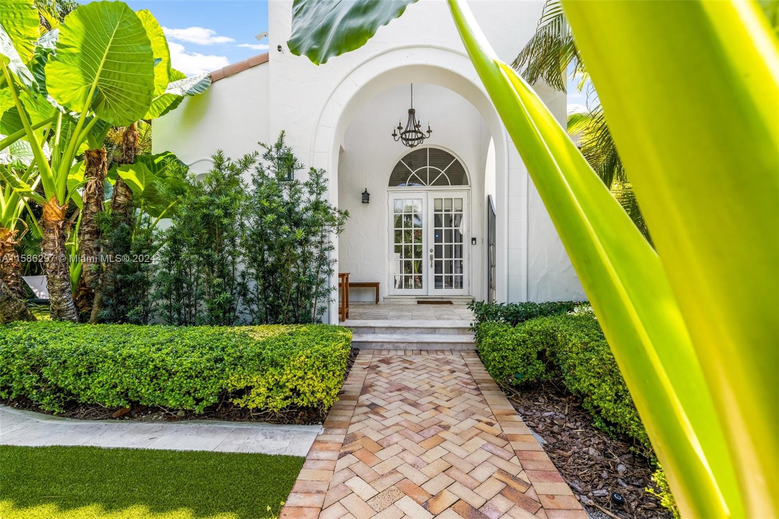 200 Ridgewood Road Coral Gables, FL 33133 - Photo 17 of 70 a view of swimming pool with a garden