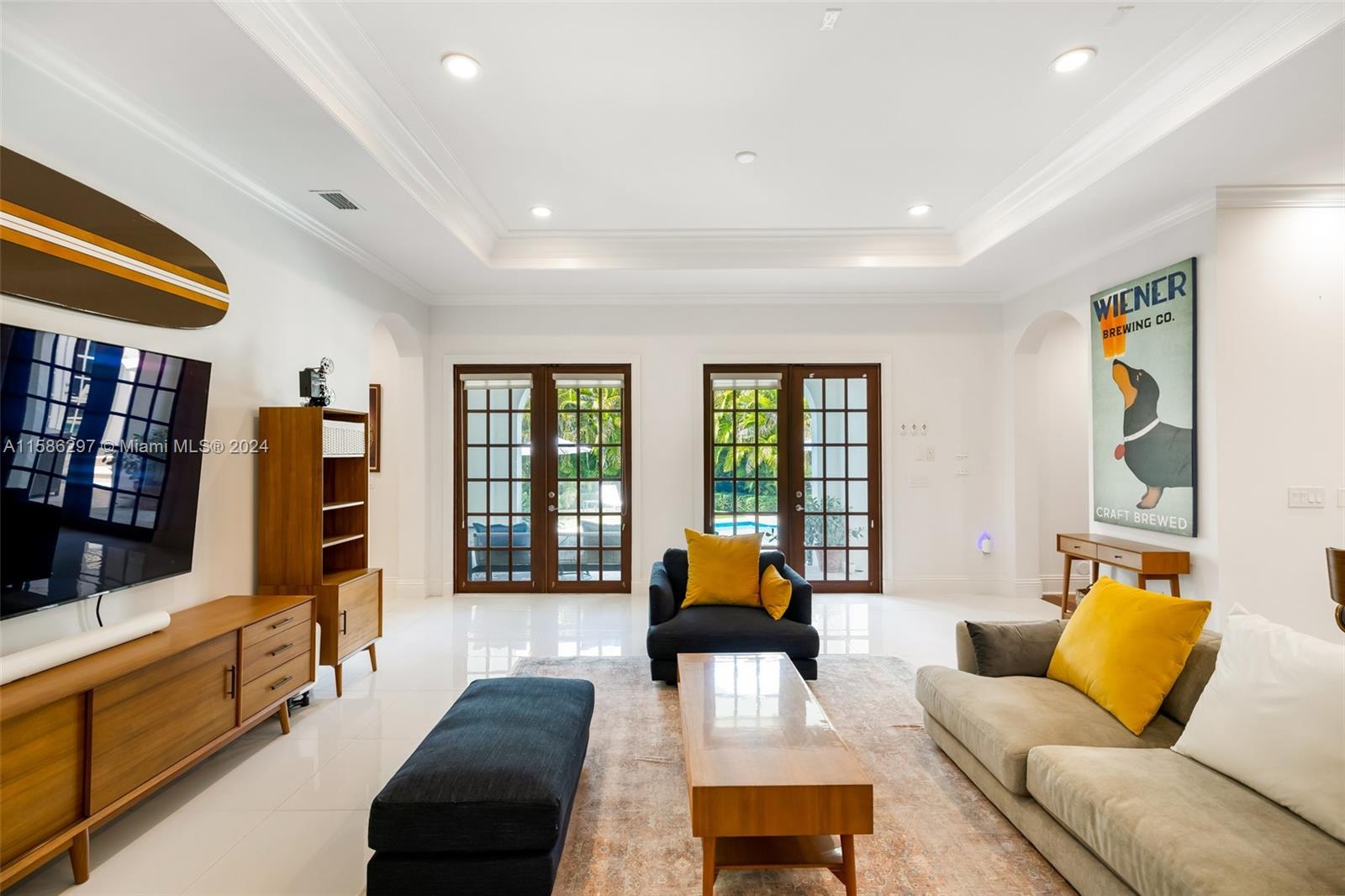 200 Ridgewood Road Coral Gables, FL 33133 - Photo 28 of 70 a living room with furniture and large window