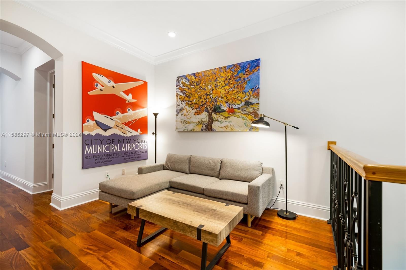 200 Ridgewood Road Coral Gables, FL 33133 - Photo 36 of 70 a living room with furniture and a flat screen tv