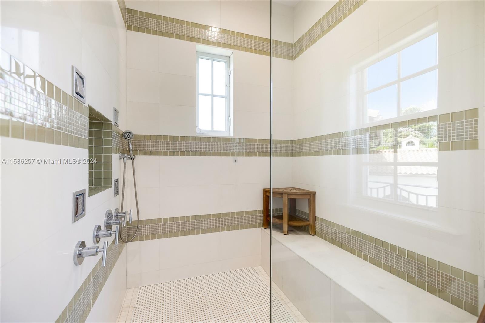 200 Ridgewood Road Coral Gables, FL 33133 - Photo 50 of 70 a bathroom with a tub and a window