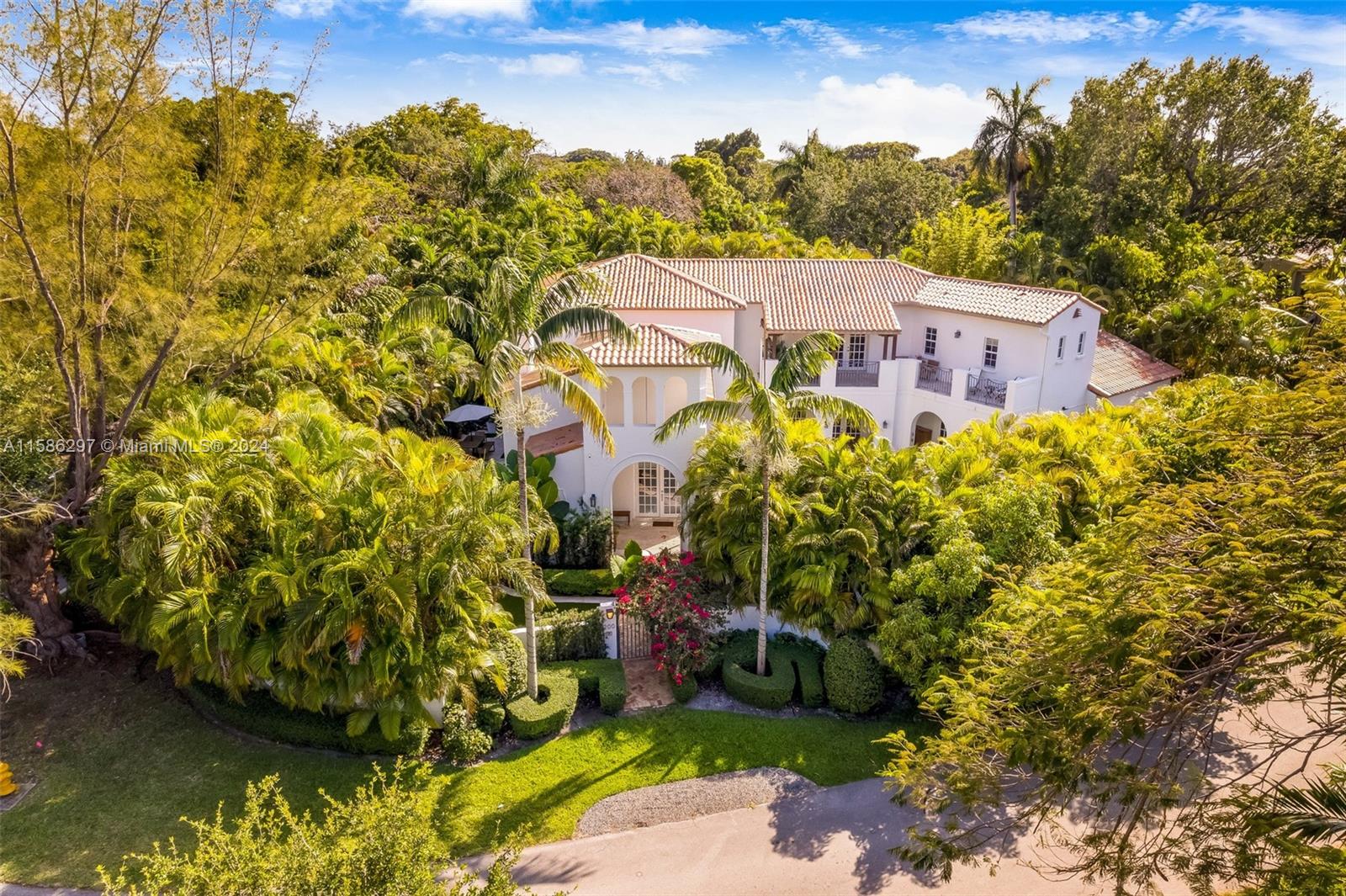 200 Ridgewood Road Coral Gables, FL 33133 - Photo 5 of 70 a view of a house with a yard