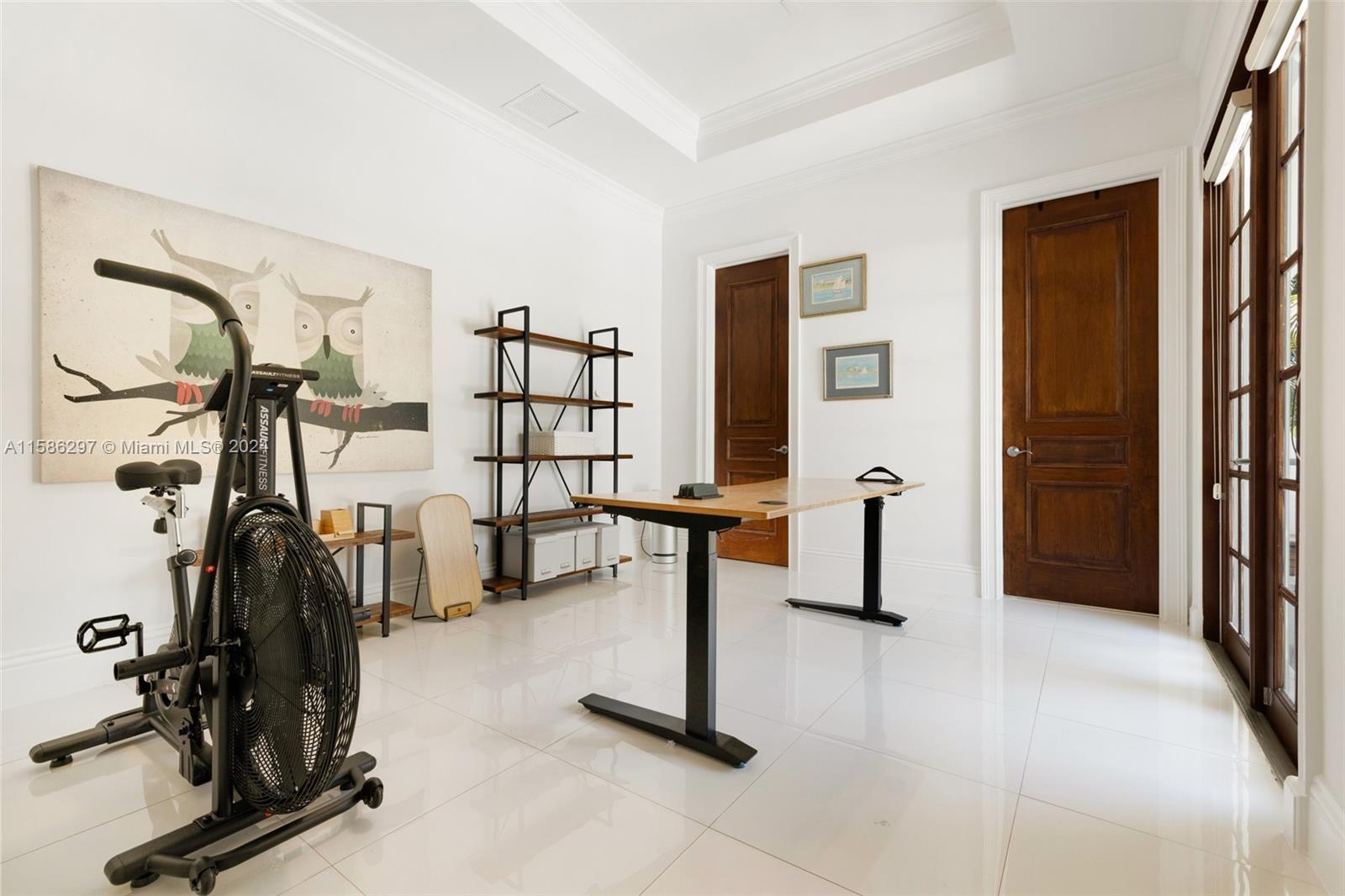 200 Ridgewood Road Coral Gables, FL 33133 - Photo 56 of 70 a view of a room with gym equipment