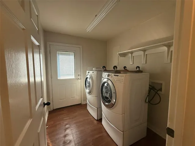a utility room with dryer and washer