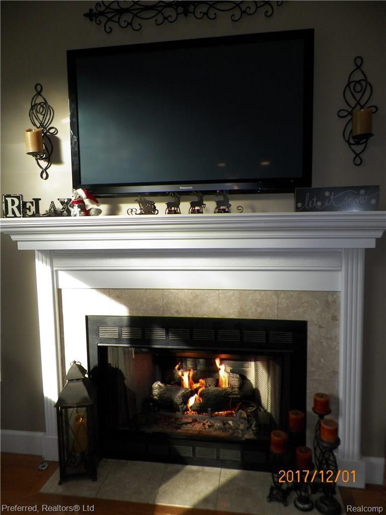 6595 Weed Road Plymouth, MI 48170 - Photo 28 of 42 Fabulous Fireplace for those Cozy winter nights... Looks like a natural doesn't it?