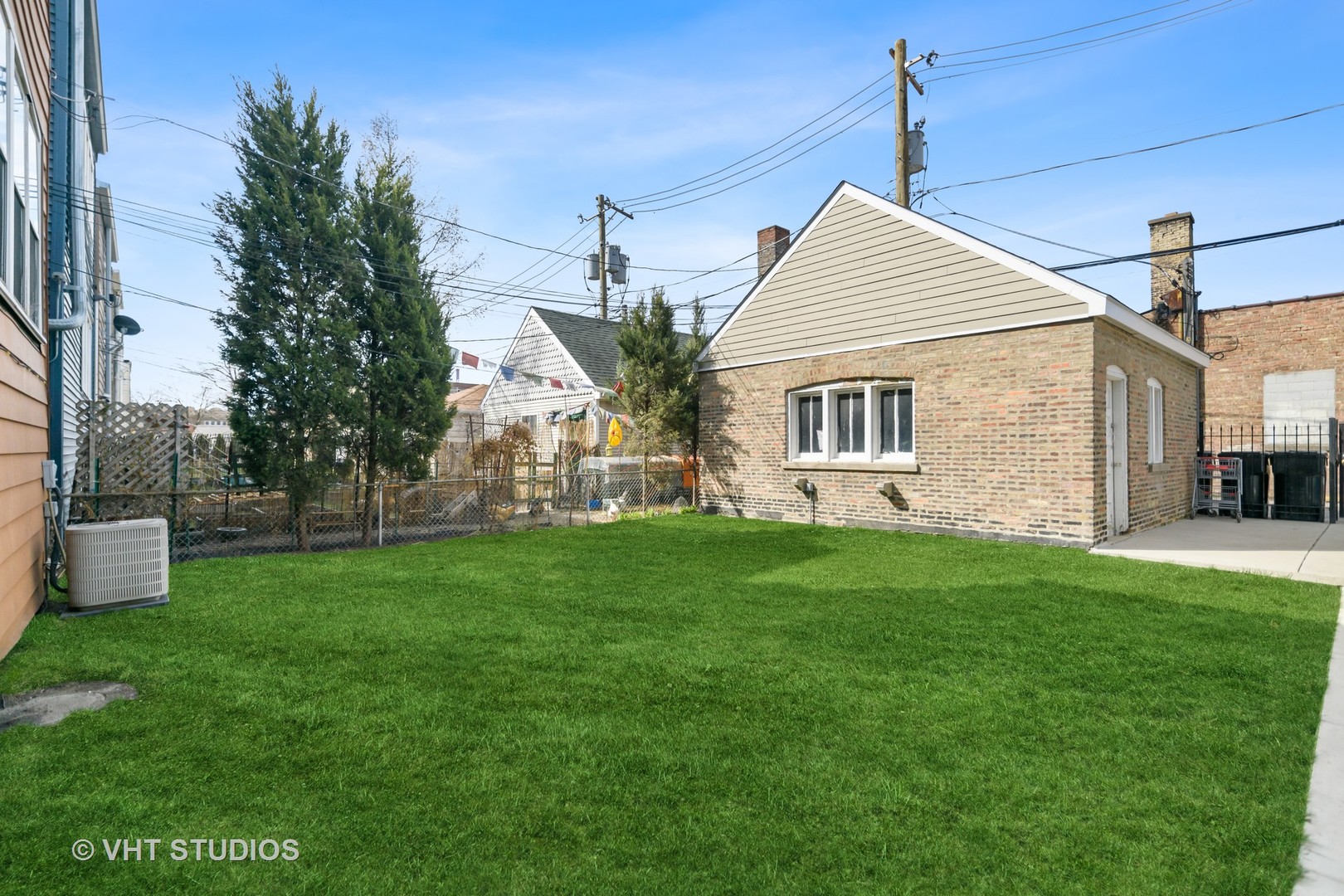 2736 North Harding Avenue, Unit 2 Chicago, IL 60647 - Photo 12 of 12 a view of a house with a backyard