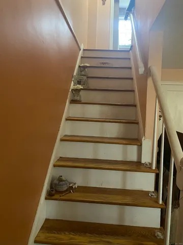 a bathroom with a toilet and a sink