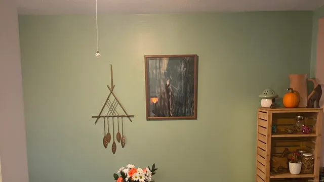a kitchen with a stove and a wooden cabinets