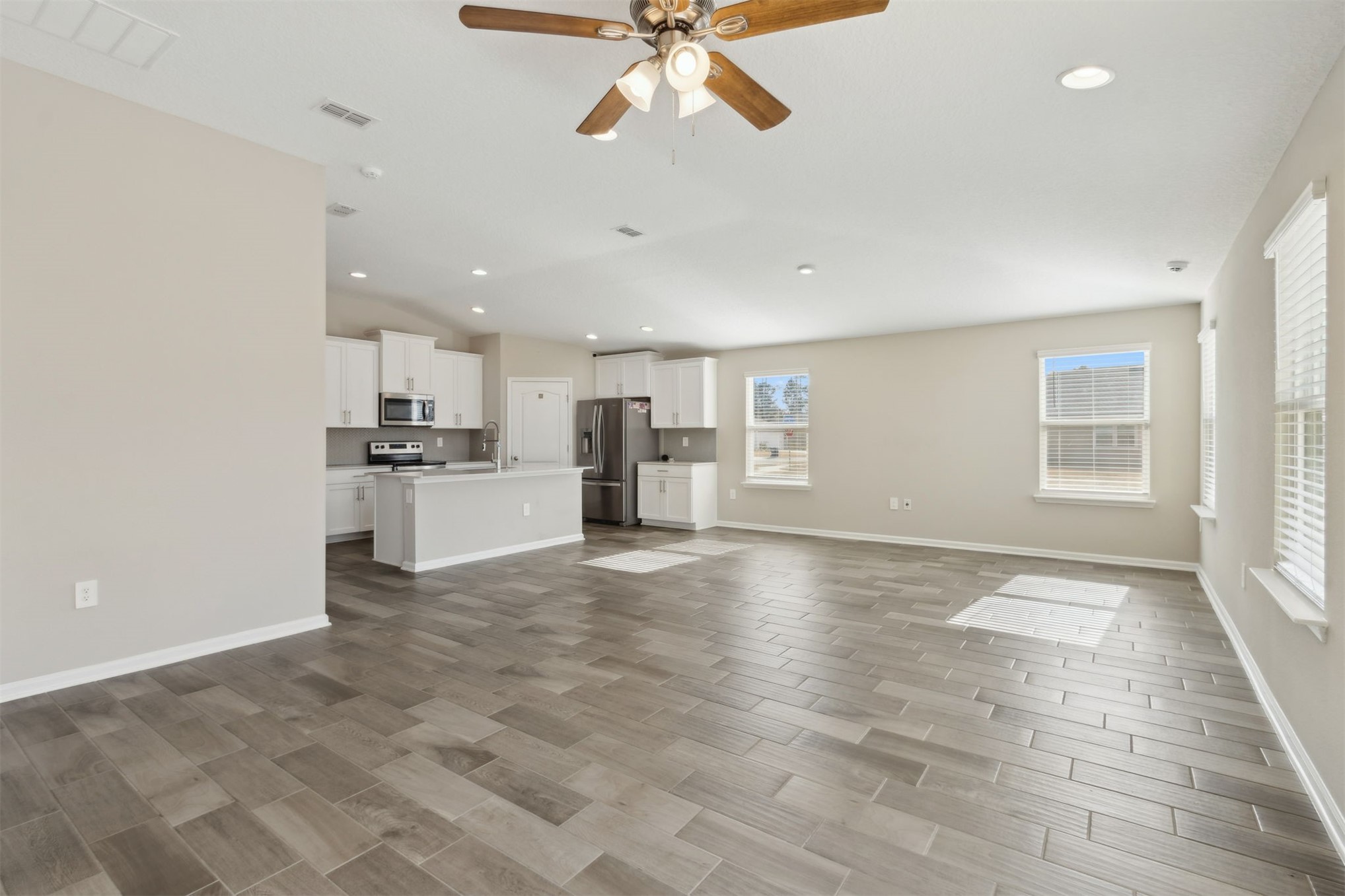 65860 Edgewater Drive Yulee, FL 32097 - Photo 17 of 39 a view of a kitchen with a sink and cabinets