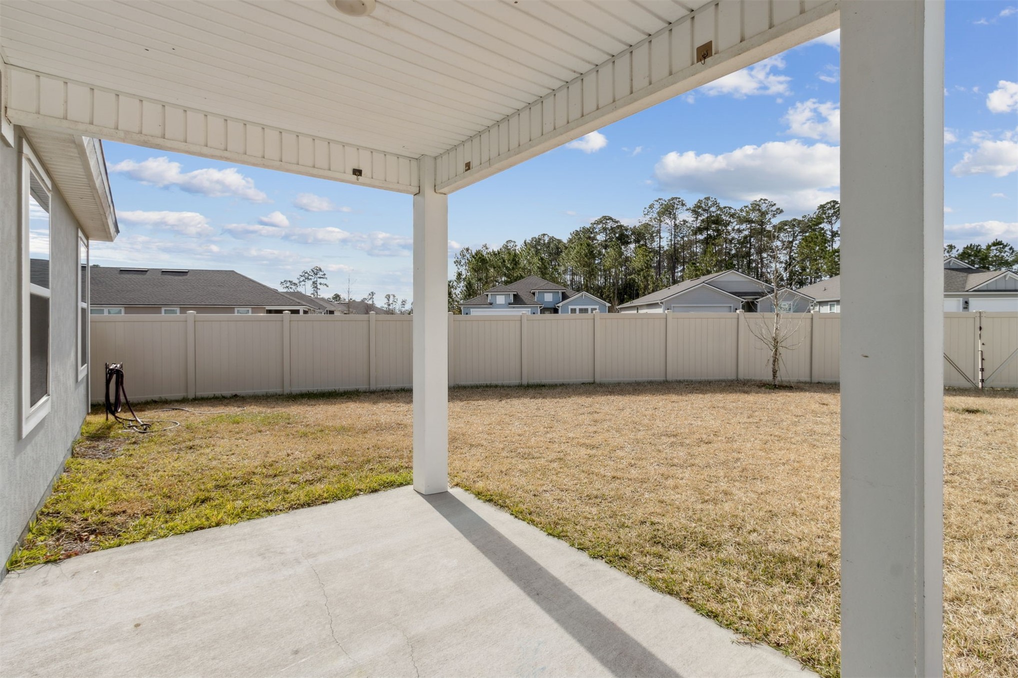 65860 Edgewater Drive Yulee, FL 32097 - Photo 25 of 39 a view of a back yard from a balcony