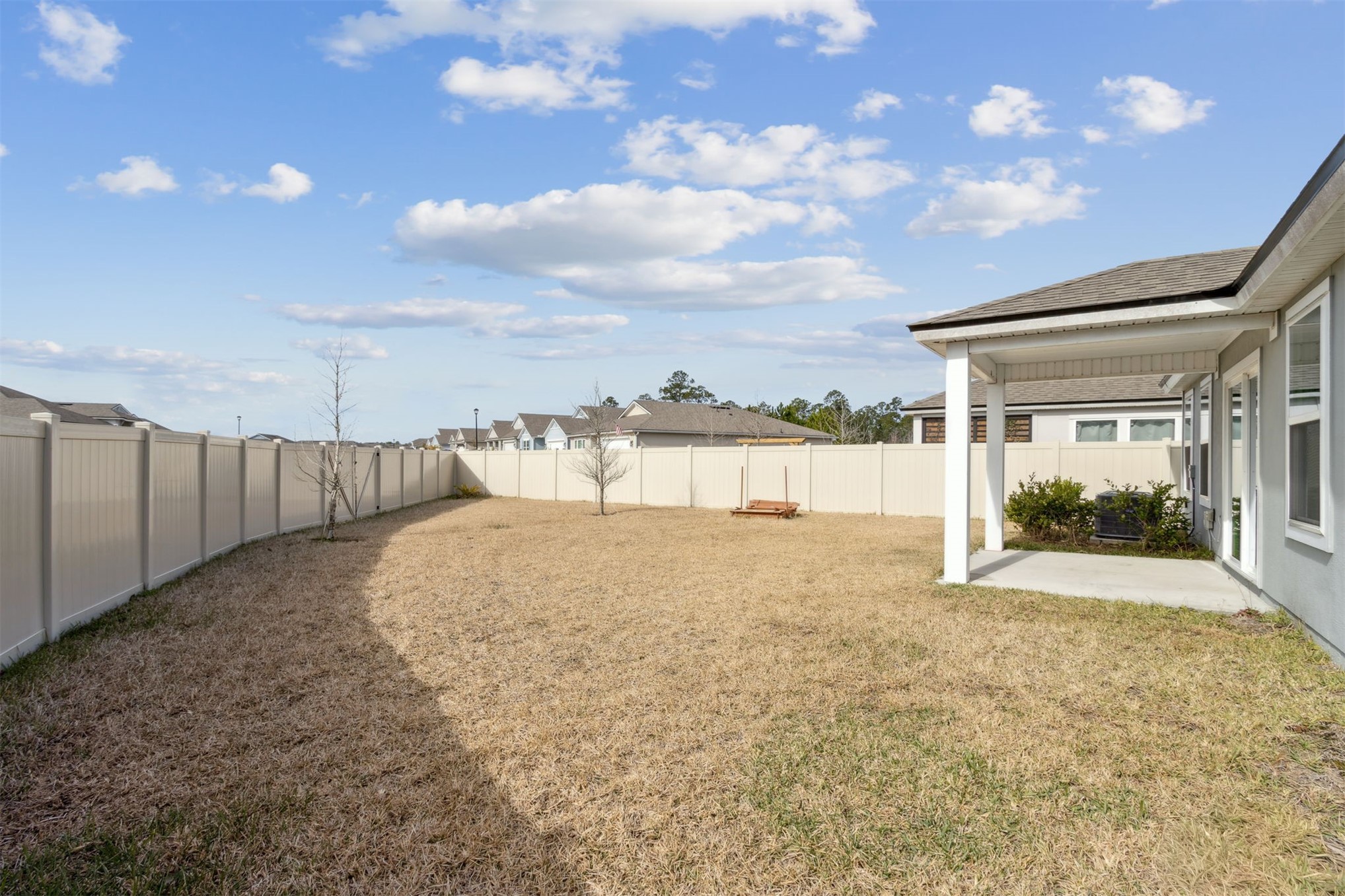 65860 Edgewater Drive Yulee, FL 32097 - Photo 26 of 39 a view of a backyard
