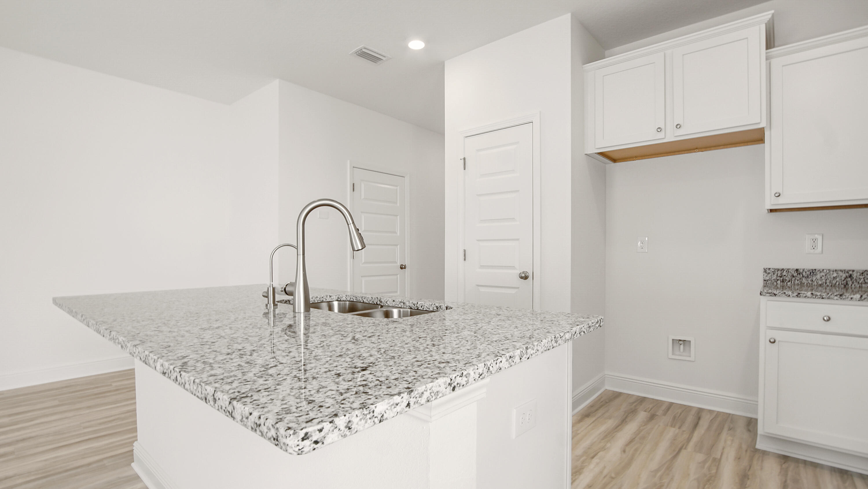 44 Phoenix Street Santa Rosa Beach, FL 32459 - Photo 16 of 37 a kitchen with granite countertop a sink and a stove