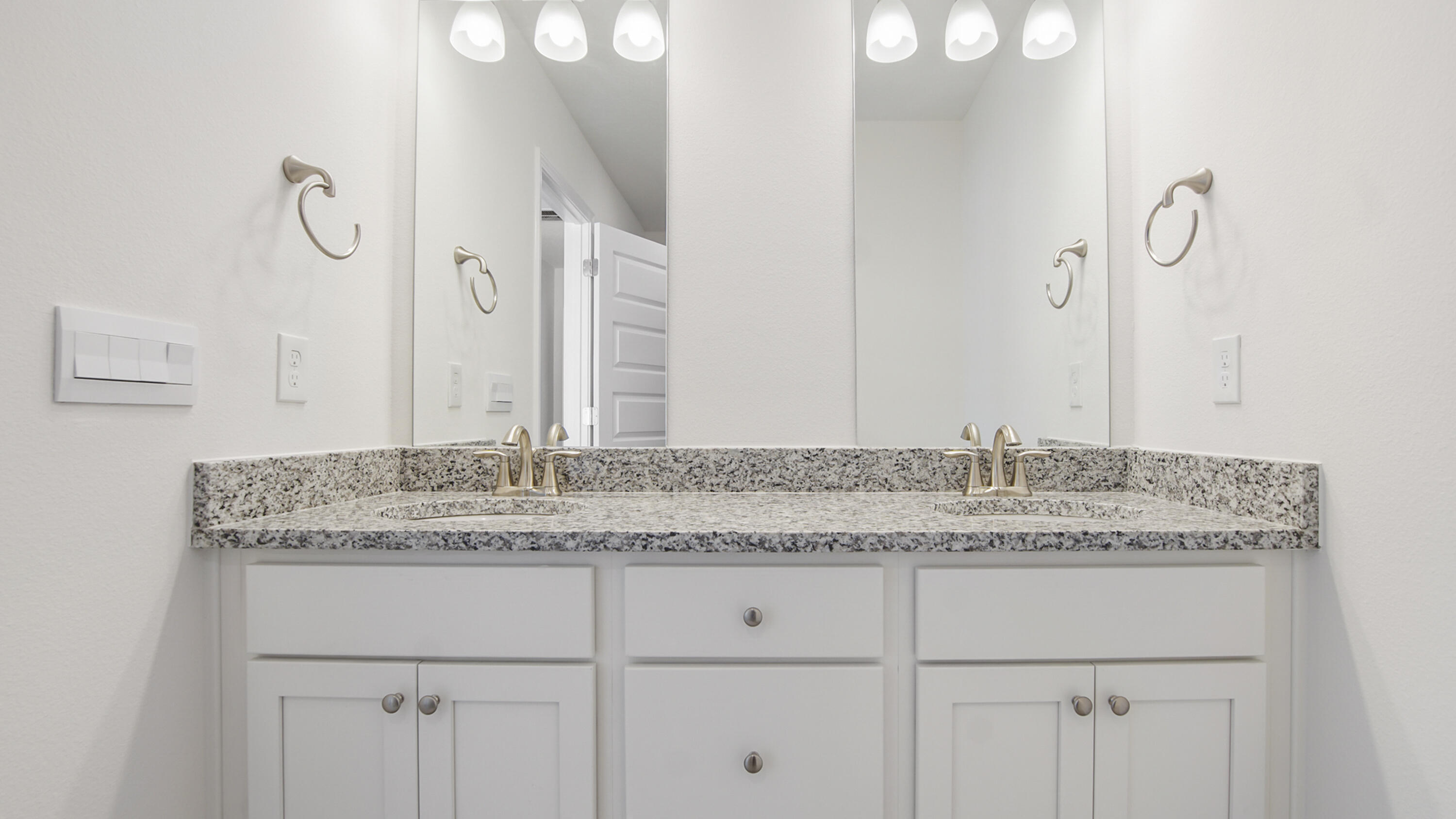 44 Phoenix Street Santa Rosa Beach, FL 32459 - Photo 24 of 37 a bathroom with a granite countertop sink and a mirror