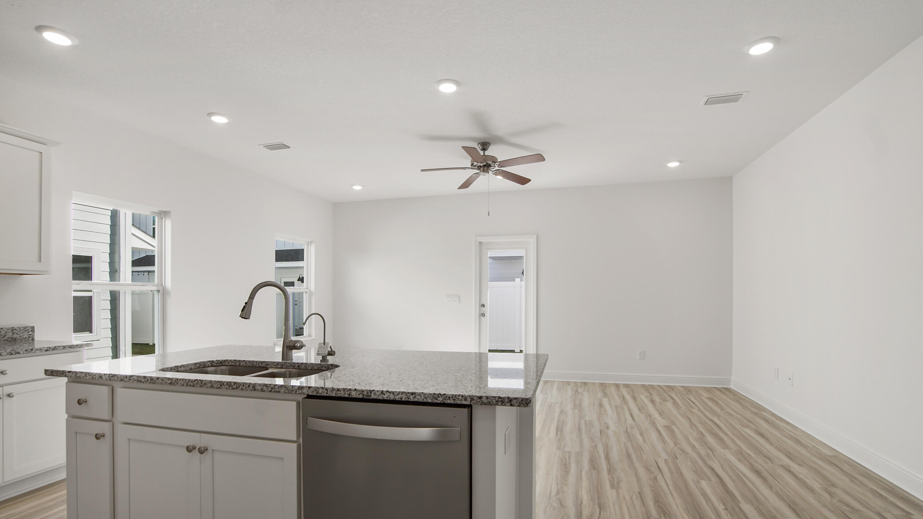 44 Phoenix Street Santa Rosa Beach, FL 32459 - Photo 9 of 37 a kitchen with sink and cabinets