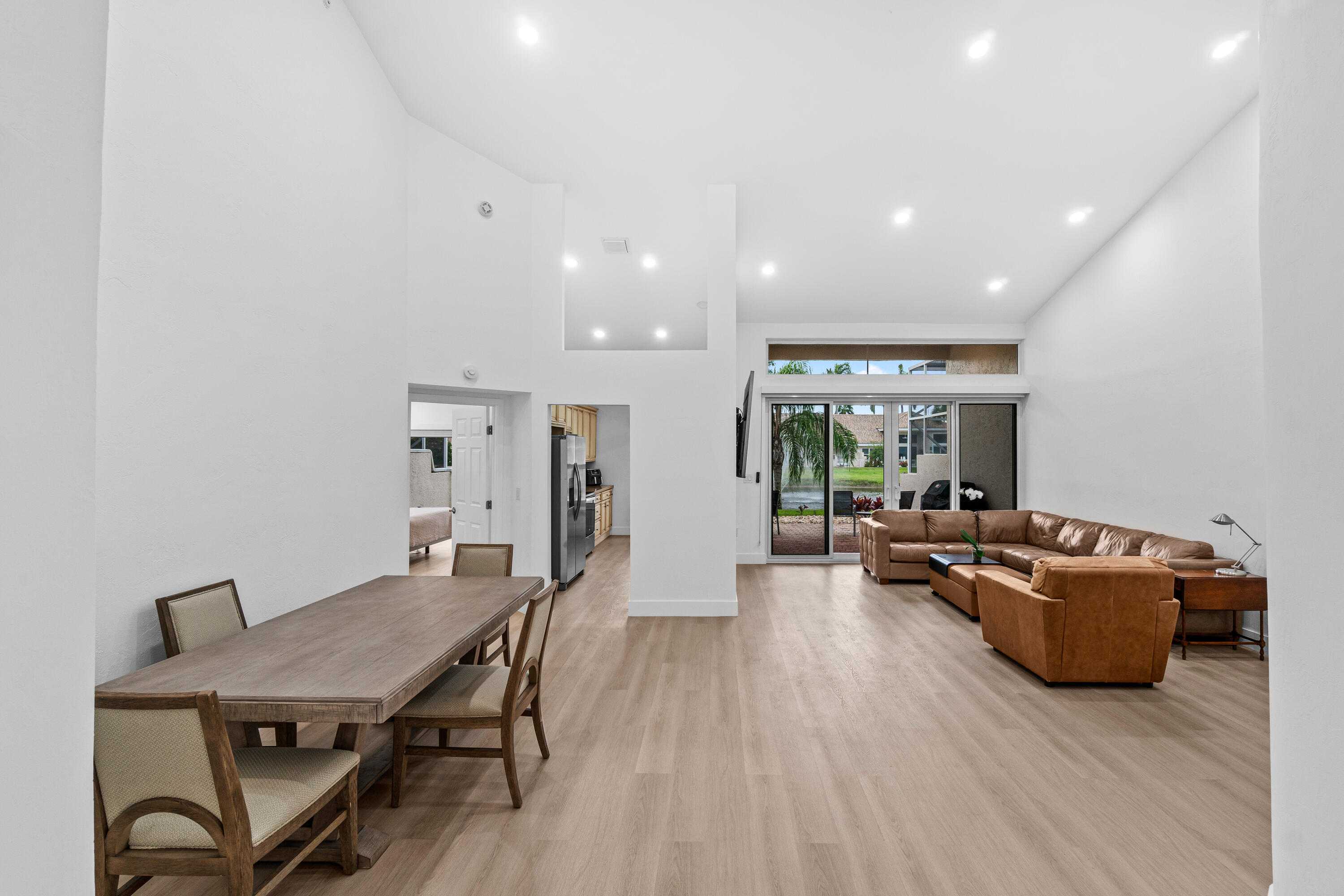 5097 Windsor Parke Drive Boca Raton, FL 33496 - Photo 3 of 27 a living room with furniture and a wooden floor