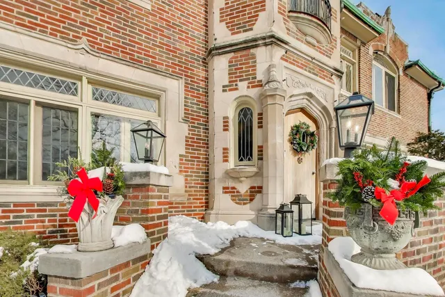 a view of a patio with couches table and chairs and potted plants