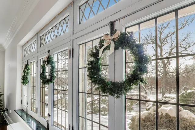 a view of a house with a tree