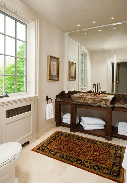 833 Blackburn Road Sewickley, PA 15143 - Photo 16 of 19 a bathroom with a sink a toilet and mirror