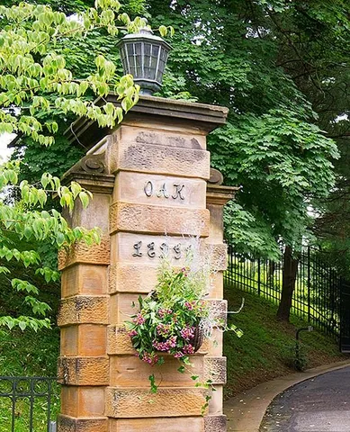 a sign that is on the side of a tree