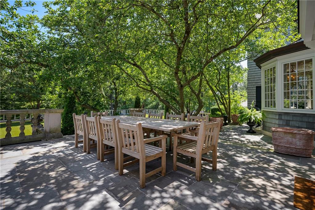 833 Blackburn Road Sewickley, PA 15143 - Photo 5 of 19 a view of a dinning table and chairs in the patio