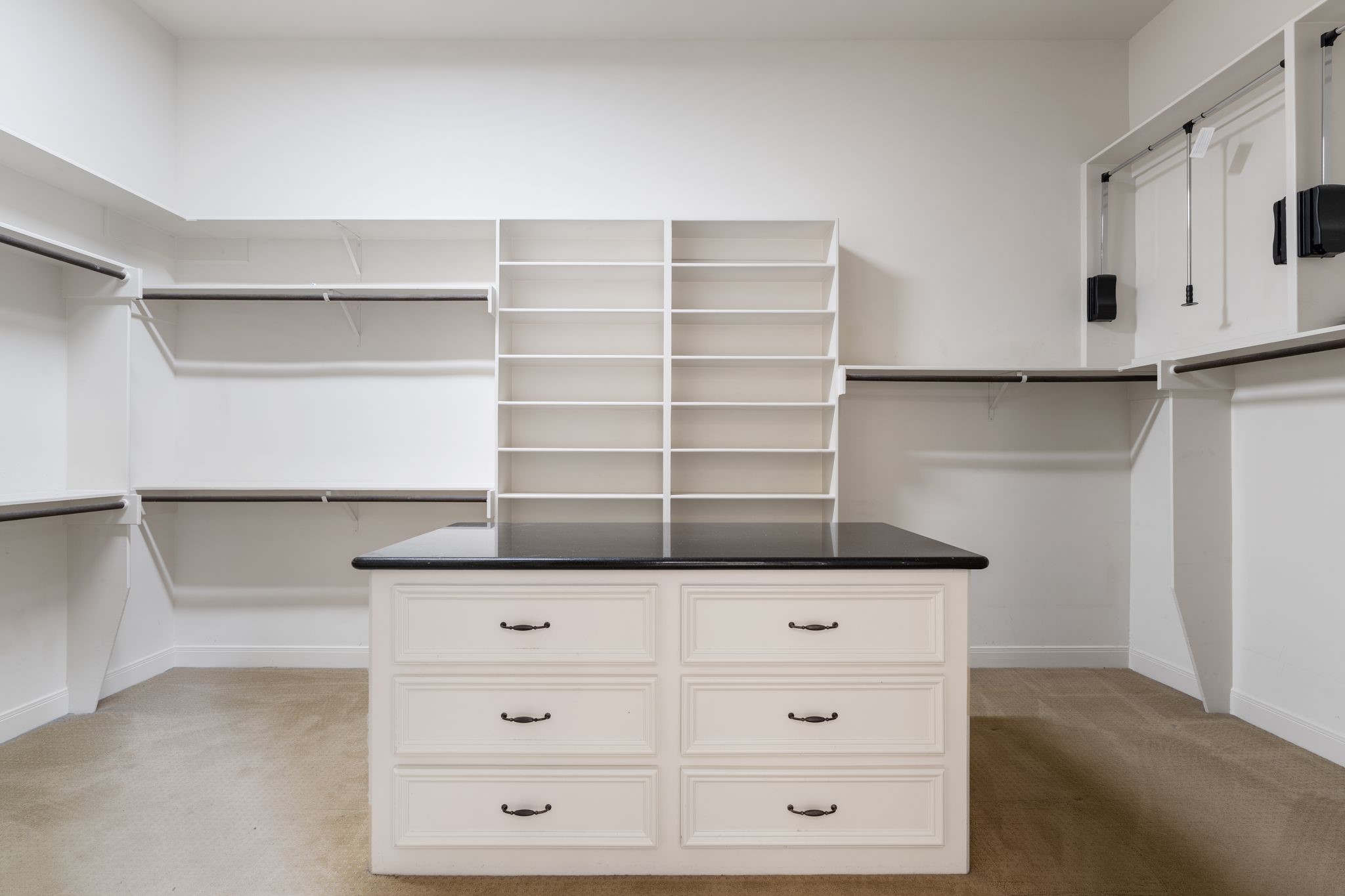 16502 Glorietta Turn Houston, TX 77068 - Photo 29 of 50 Spacious primary closet with center island and draws