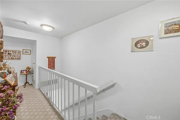 a view of a hallway with workspace