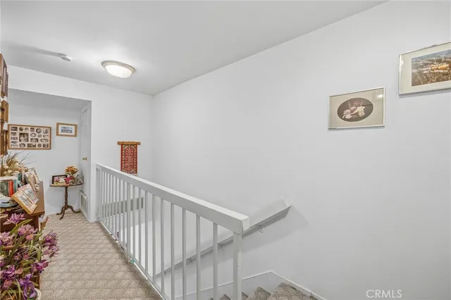 a view of a hallway with workspace