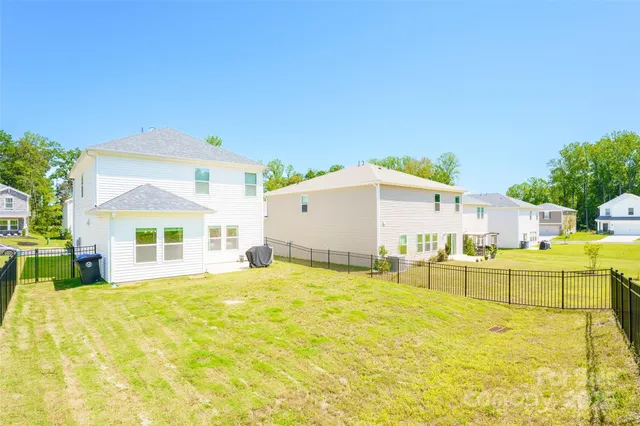 a view of a house with a swimming pool
