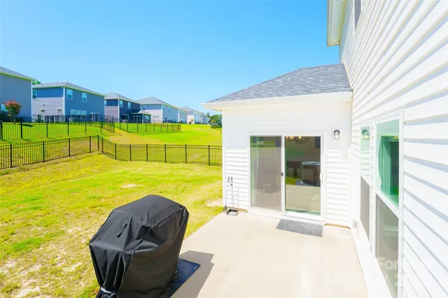 a view of swimming pool with outdoor seating