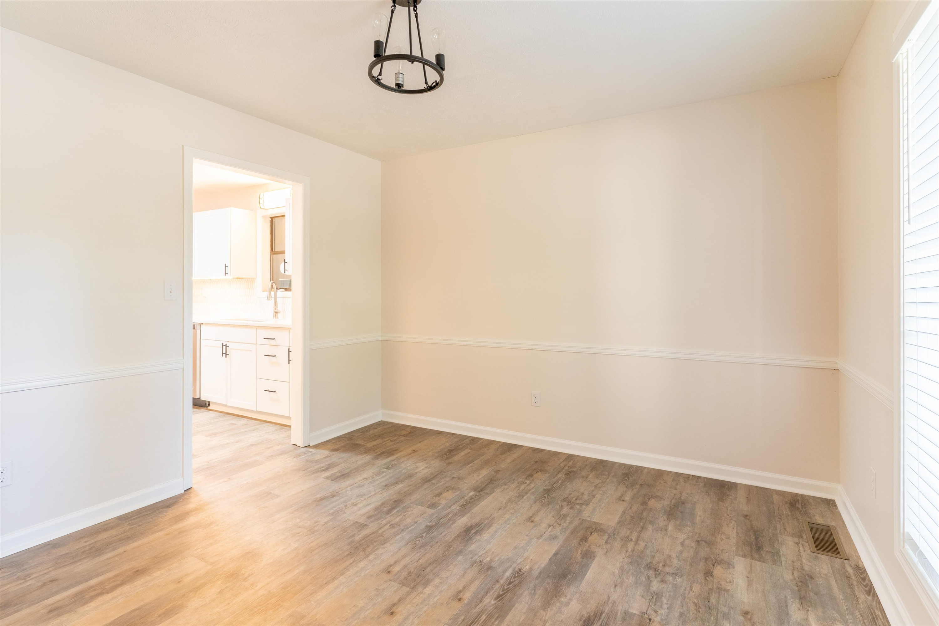 98 Ridgeoak Place Jackson, TN 38305 - Photo 11 of 23 a view of empty room with wooden floor