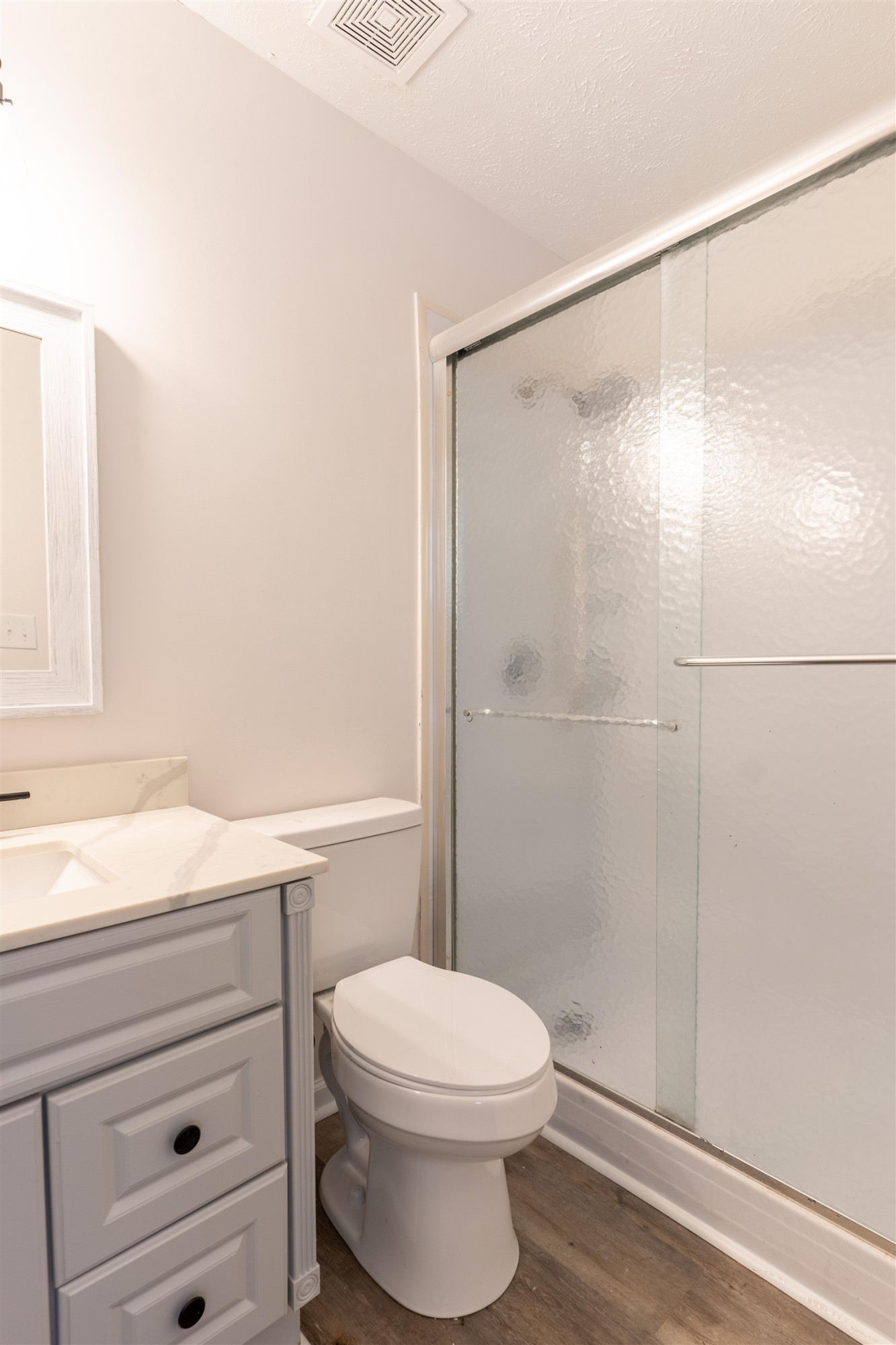 98 Ridgeoak Place Jackson, TN 38305 - Photo 12 of 23 a bathroom with a toilet a sink and shower