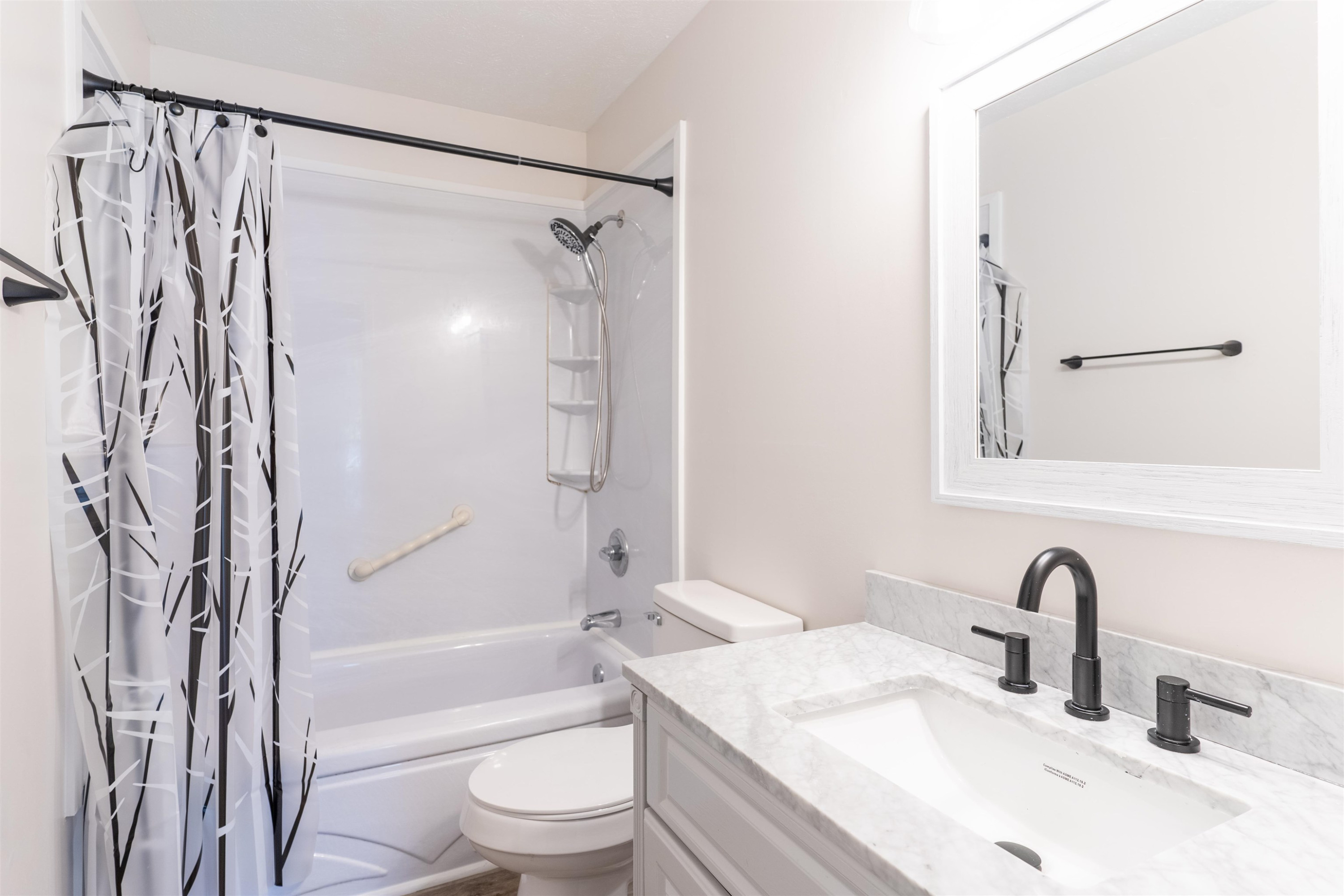98 Ridgeoak Place Jackson, TN 38305 - Photo 13 of 23 a bathroom with a granite countertop sink toilet and shower