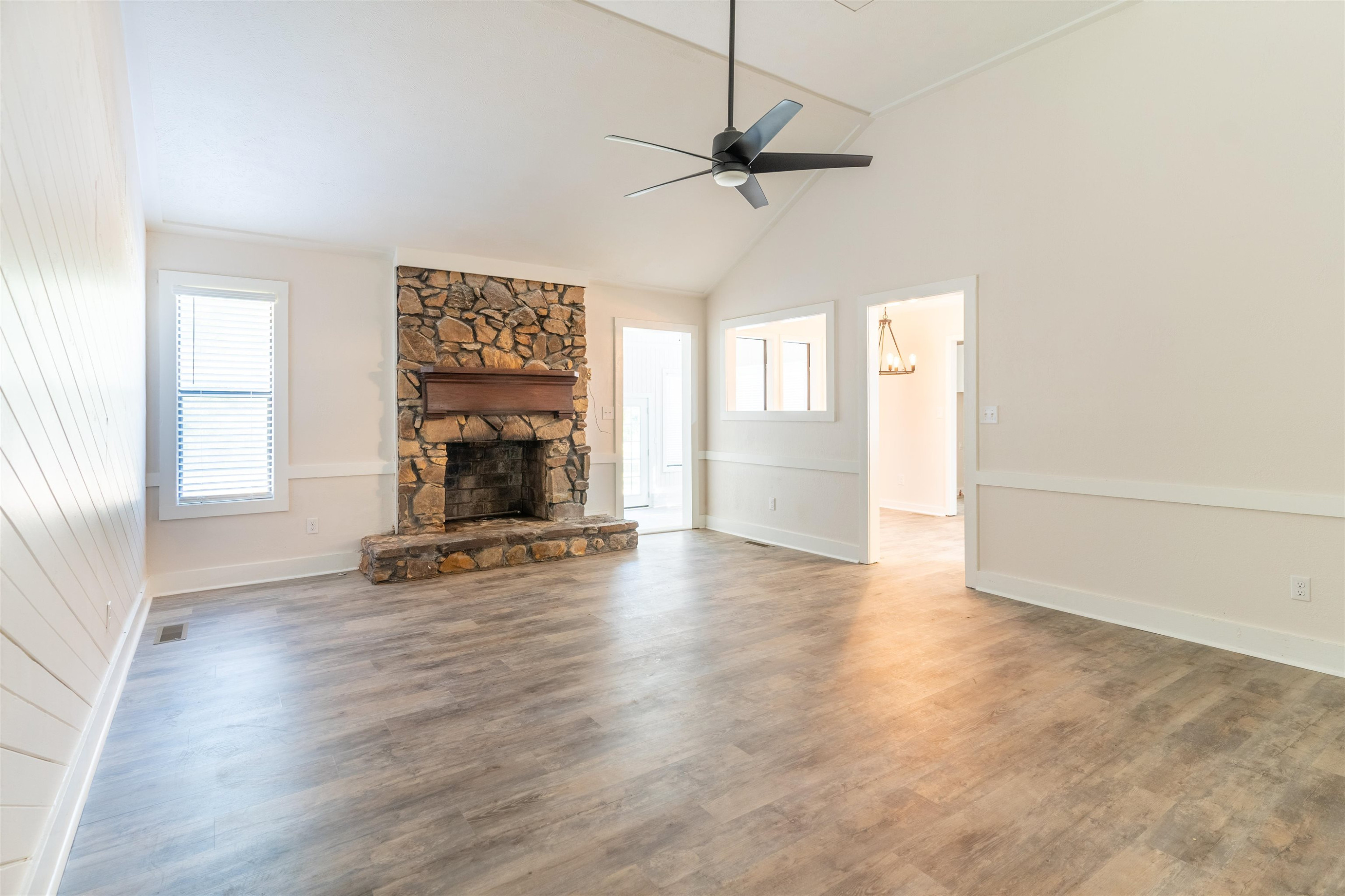 98 Ridgeoak Place Jackson, TN 38305 - Photo 2 of 23 a view of empty room with fireplace and wooden floor