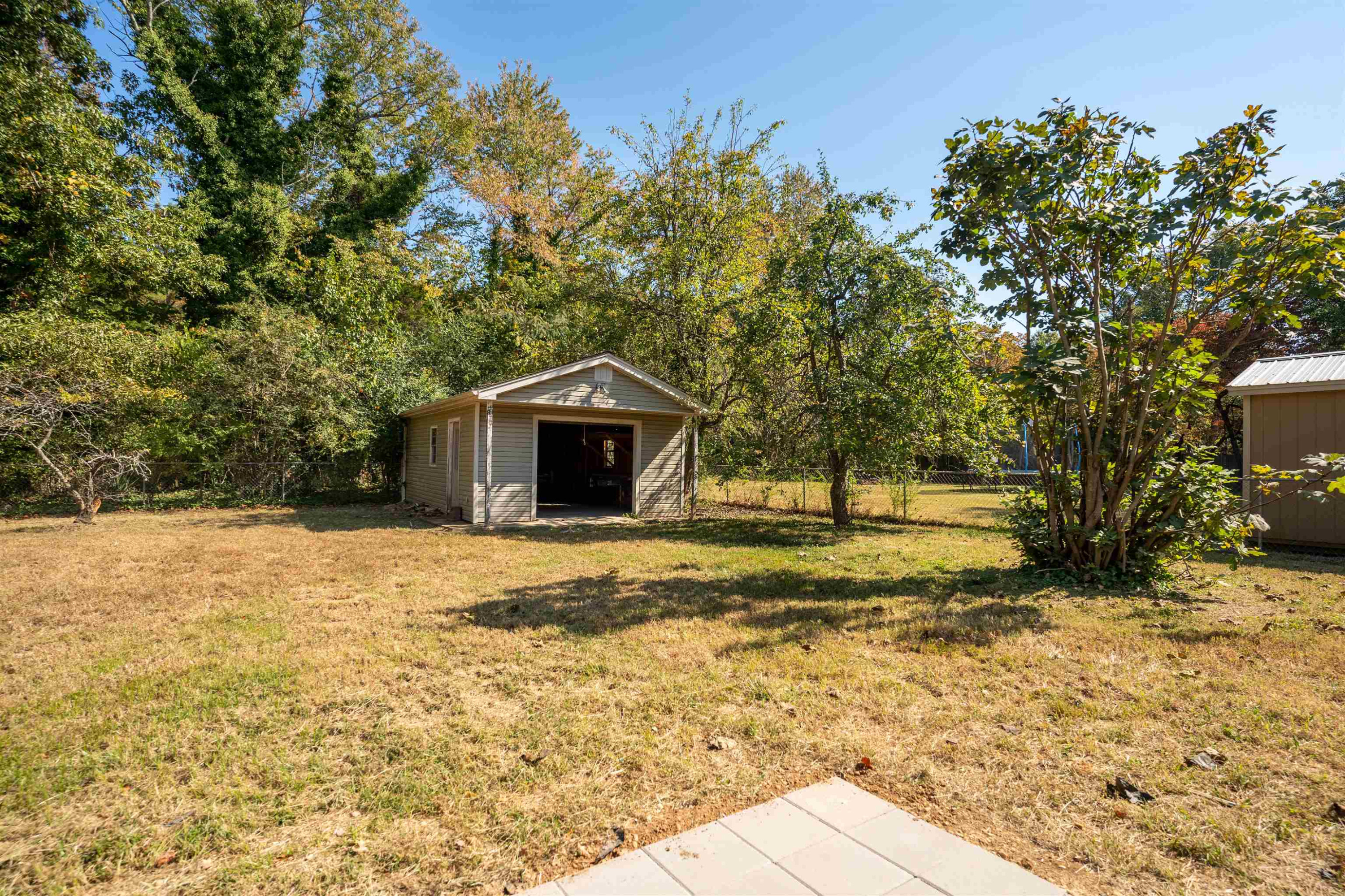 98 Ridgeoak Place Jackson, TN 38305 - Photo 23 of 23 a front view of a house with a yard