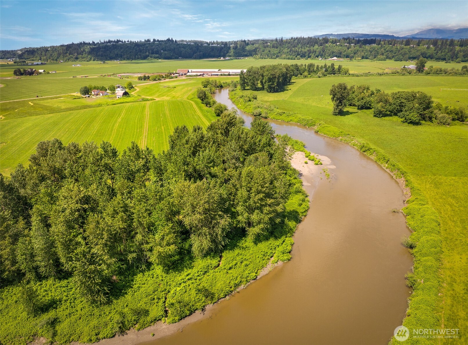 2304 Norman Road Stanwood, WA 98292 - Photo 28 of 39 a view of a lake with a city view