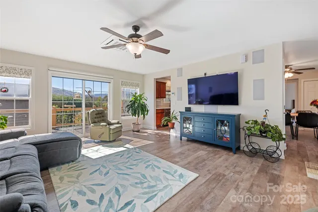 a view of kitchen with cabinets