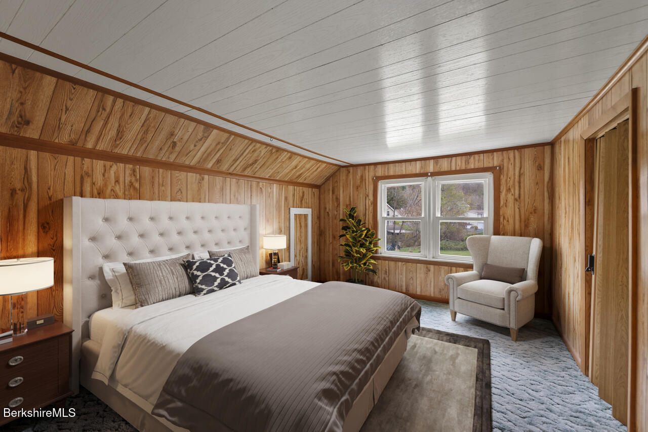 227 Protection Avenue North Adams, MA 01247 - Photo 20 of 25 a bedroom with a bed couch and window