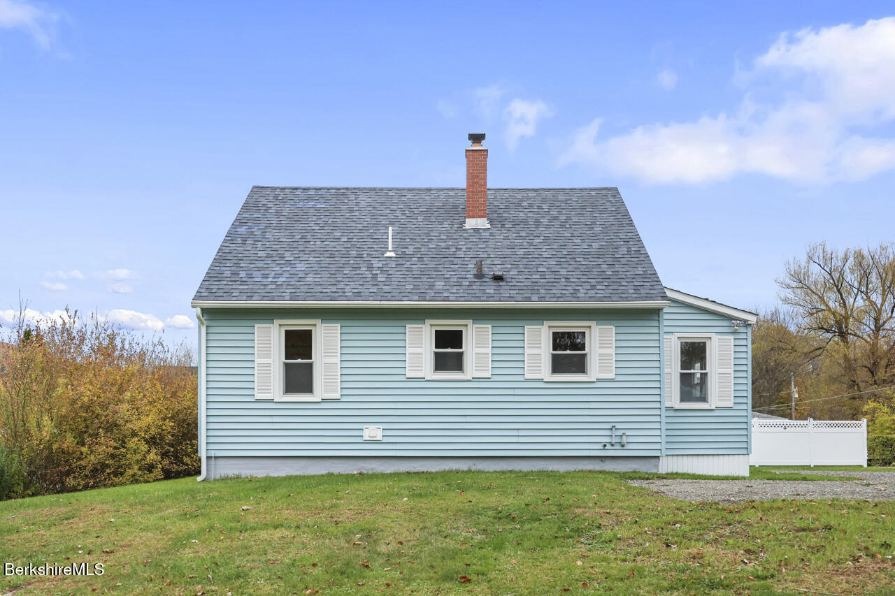 227 Protection Avenue North Adams, MA 01247 - Photo 5 of 25 a front view of a house with a garden