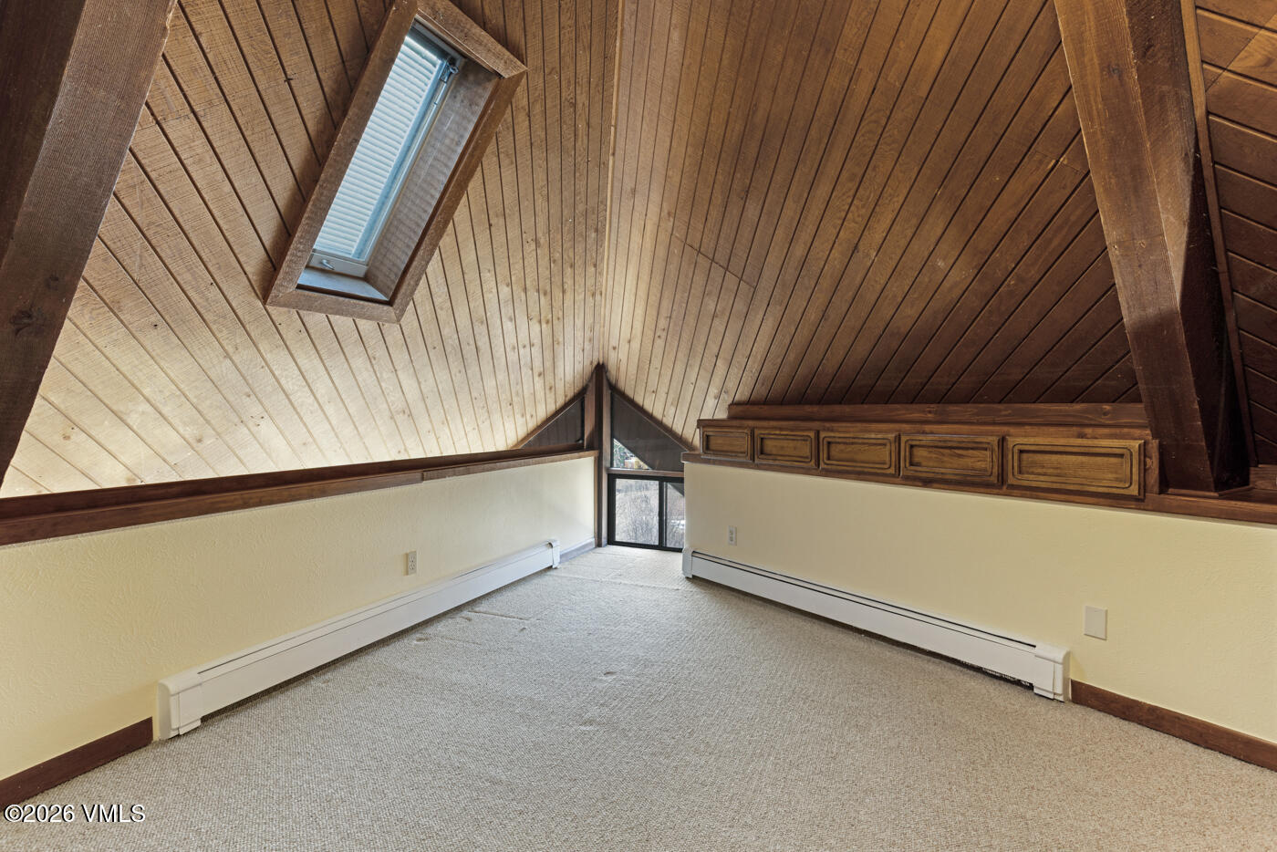 1400 Lions Ridge Loop, Unit A1 Vail, CO 81657 - Photo 17 of 41 a view of a room with wooden walls