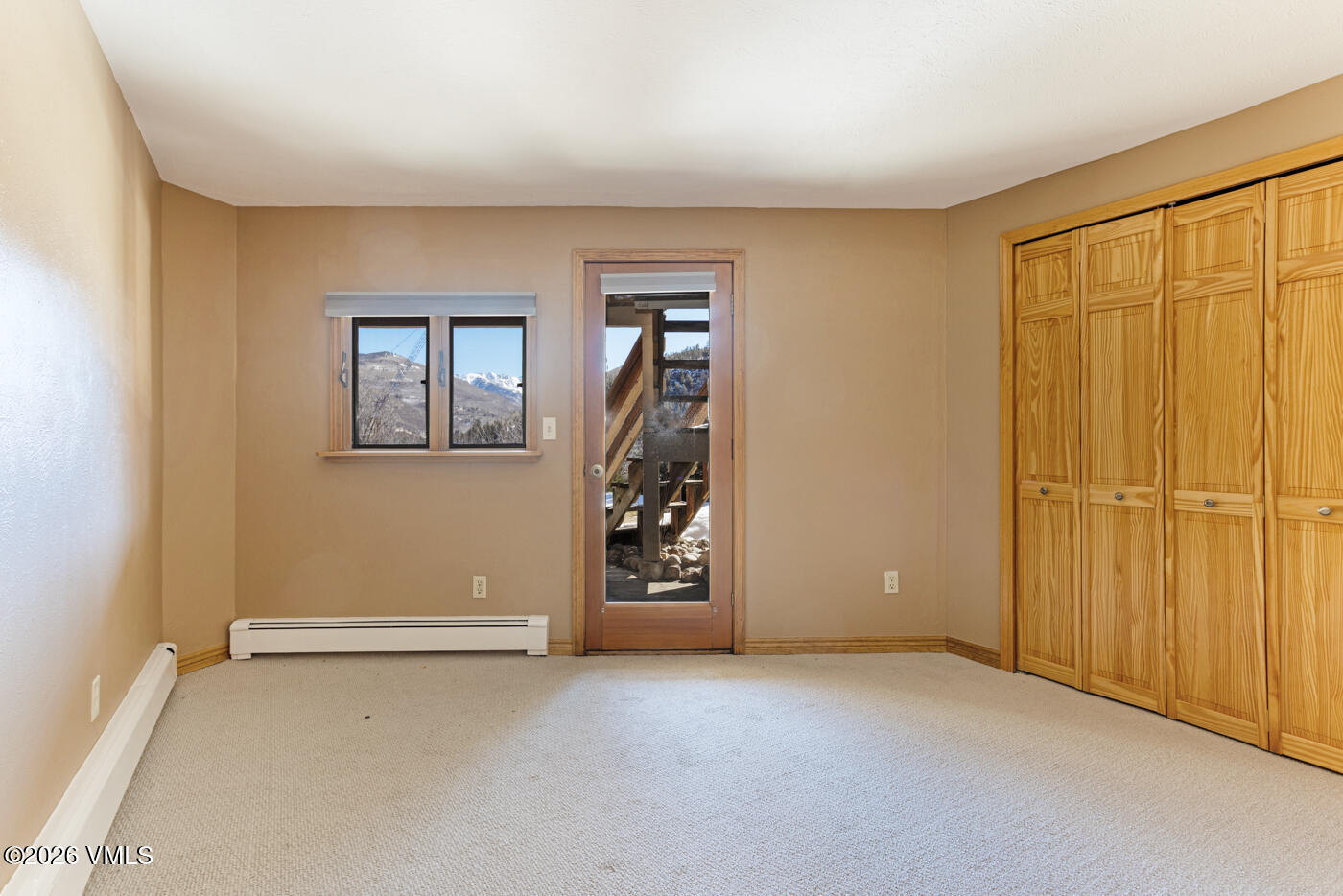 1400 Lions Ridge Loop, Unit A1 Vail, CO 81657 - Photo 21 of 41 an empty room with windows