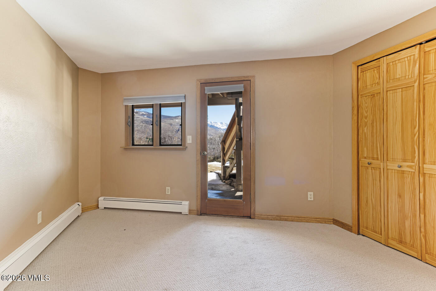 1400 Lions Ridge Loop, Unit A1 Vail, CO 81657 - Photo 22 of 41 an empty room with windows and closet
